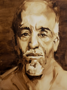 a sepia-toned portrait of an elderly man.